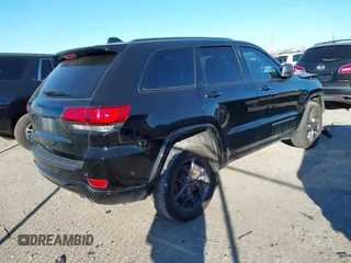 2021 Jeep Grand Cherokee 80th Anniversary with VIN 1C4RJFBG9MC527654, listed as a IAAI auction lot 41212055 with 92,436 mi miles and . Bid and sale history available at DreamBid. Image 4.