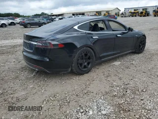 2014 Tesla Model S 60 with VIN 5YJSA1H11EFP65266, listed as a Copart auction lot 60934805 with 93,546 mi miles and Salvage title. Bid and sale history available at DreamBid. Image 3.