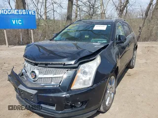 2012 Cadillac SRX Performance Collection z VIN 3GYFNEE31CS569555, wystawiony jako IAAI lot #41919585 z przebiegiem 126 991 mil mil oraz . Historia ofert i sprzedaży dostępna na DreamBid. Obrazek 2.