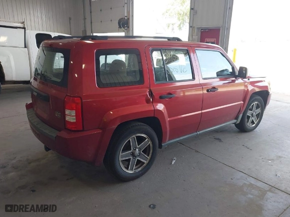 2010 Jeep Patriot Sport with VIN 1J4NF2GB1AD508652, listed as a IAAI auction lot 39951035 with 191,642 mi miles. Bid and sale history available at carsss.com. Image 4.