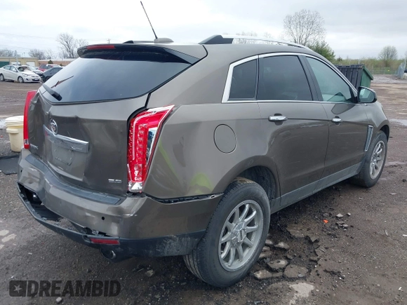 2015 Cadillac SRX Luxury Collection with VIN 3GYFNBE34FS521518, listed as a IAAI auction lot 41893073 with 82,700 mi miles and . Bid and sale history available at carsss.com. Image 4.