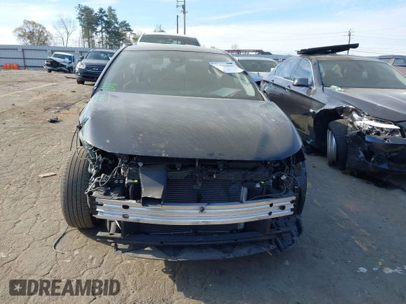 2022 Toyota Corolla LE with VIN JTDEPMAE9NJ209872, listed as a IAAI auction lot 41902891 with 37,479 mi miles and . Bid and sale history available at DreamBid. Image 12.