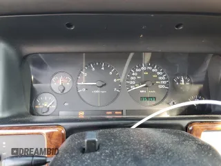 1997 Jeep Grand Cherokee Laredo with VIN 1J4GZ58S5VC688455, listed as a Copart auction lot 74294204 with 135,143 mi miles and Salvage Title. Bid and sale history available at carsss.com. Image 9.