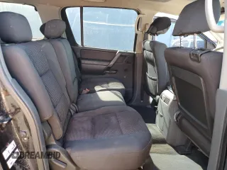2006 Nissan Armada LE z VIN 5N1AA08A76N704895, wystawiony jako Copart lot #43348725 z przebiegiem 347 843 mil mil oraz Szkoda całkowita • Salvage title. Historia ofert i sprzedaży dostępna na DreamBid. Obrazek 11.