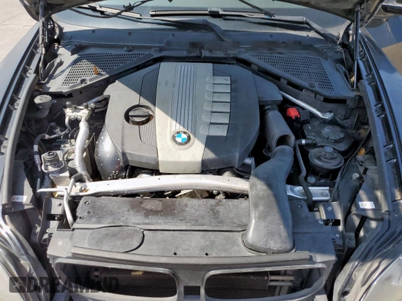 2012 BMW X5 35d with VIN 5UXZW0C57CL664245, listed as a Copart auction lot 58356885 with 148,517 mi miles and Clean title. Bid and sale history available at DreamBid. Image 11.