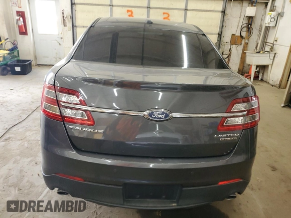 2017 Ford Taurus Limited z VIN 1FAHP2F81HG111818, wystawiony jako Copart lot #50169665 z przebiegiem 122 018 mil mil oraz Szkoda całkowita • Salvage title. Historia ofert i sprzedaży dostępna na DreamBid. Obrazek 6.