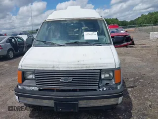 1991 Chevrolet Astro Cargo z VIN 1GBDM19Z7MB202913, wystawiony jako IAAI lot #42363530 z przebiegiem 191 695 mil mil oraz . Historia ofert i sprzedaży dostępna na DreamBid. Obrazek 12.