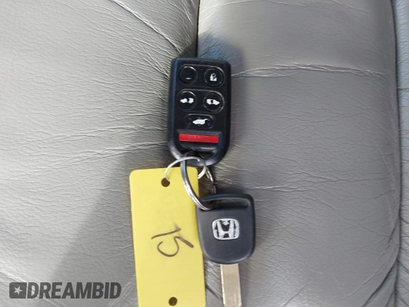2008 Honda Odyssey EX-L with VIN 5FNRL38758B061746, listed as a IAAI auction lot 41429481 with 109,428 mi miles and . Bid and sale history available at DreamBid. Image 11.