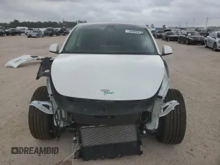 2023 Tesla Model Y Long Range z VIN 7SAYGDEE0PF802511, wystawiony jako Copart lot #54959415 z przebiegiem 12 902 mil mil oraz Szkoda całkowita • Salvage title. Historia ofert i sprzedaży dostępna na DreamBid. Obrazek 5.