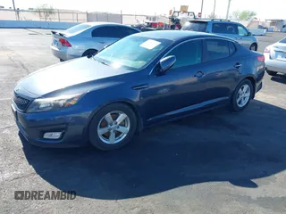 2015 Kia Optima LX z VIN KNAGM4A73F5605256, wystawiony jako IAAI lot #42459022 z przebiegiem 180 233 mil mil oraz . Historia ofert i sprzedaży dostępna na DreamBid. Obrazek 13.