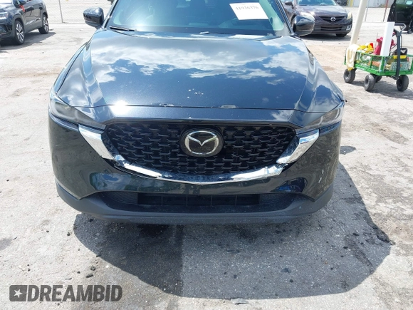 2023 Mazda CX-5 2.5 S Premium Plus Package with VIN JM3KFBEM5P0256652, listed as a IAAI auction lot 41936376 with 31,332 mi miles. Bid and sale history available at carsss.com. Image 6.