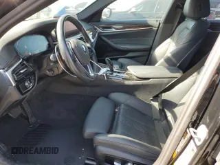 2023 BMW 5 Series 530i with VIN WBA53BH05PCM01563, listed as a Copart auction lot 55525515 with 23,371 mi miles and Salvage title. Bid and sale history available at DreamBid. Image 7.