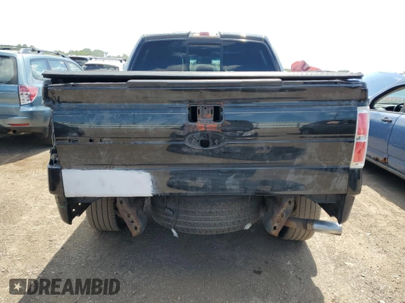 2013 Ford F-150 XL with VIN 1FTFW1ET5DFC70796, listed as a Copart auction lot 63118045 with 151,624 mi miles and Salvage title. Bid and sale history available at DreamBid. Image 6.