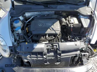 2015 Volkswagen Beetle 1.8T with VIN 3VW517AT8FM810709, listed as a Copart auction lot 48065314 with 61,924 mi miles and Salvage Title. Bid and sale history available at DreamBid. Image 11.