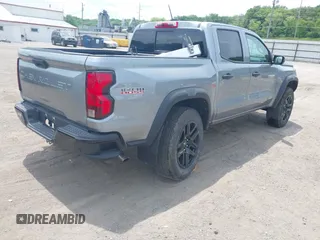2024 Chevrolet Colorado 4WD Trail Boss with VIN 1GCPTEEK6R1293343, listed as a IAAI auction lot 42524617 with 5,284 mi miles and . Bid and sale history available at DreamBid. Image 4.