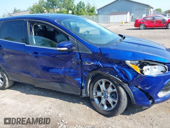 2013 Ford Escape SEL z VIN 1FMCU9H92DUA24951, wystawiony jako IAAI lot #42408755 z przebiegiem 173 549 mil mil oraz . Historia ofert i sprzedaży dostępna na DreamBid. Obrazek 6.