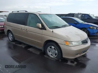 1999 Honda Odyssey EX z VIN 2HKRL1867XH535563, wystawiony jako IAAI lot #42188335 z przebiegiem 198 322 mil mil oraz . Historia ofert i sprzedaży dostępna na DreamBid. Obrazek 1.