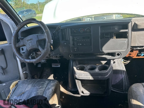 2003 GMC Savana Cargo z VIN 1GTHG35U431113170, wystawiony jako Copart lot #78915184 z przebiegiem 293 807 mil mil oraz Czysty tytuł • Clean title. Historia ofert i sprzedaży dostępna na DreamBid. Obrazek 9.