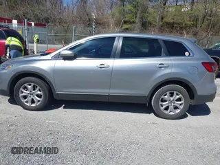 2015 Mazda CX-9 Sport with VIN JM3TB2BA7F0450544, listed as a IAAI auction lot 41812565 with 81,727 mi miles and . Bid and sale history available at carsss.com. Image 14.