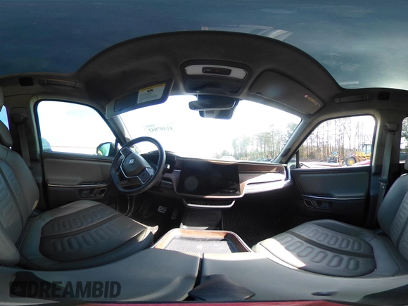 2022 Rivian R1T Adventure z VIN 7FCTGAAA8NN015369, wystawiony jako IAAI lot #41407842 z przebiegiem 22 507 mil mil oraz . Historia ofert i sprzedaży dostępna na DreamBid. Obrazek 21.