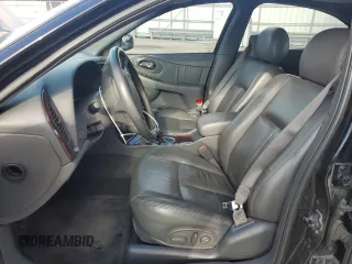 2001 Oldsmobile Aurora with VIN 1G3GR62H714104411, listed as a Copart auction lot 82601984 with 135,486 mi miles and Salvage Title. Bid and sale history available at DreamBid. Image 7.