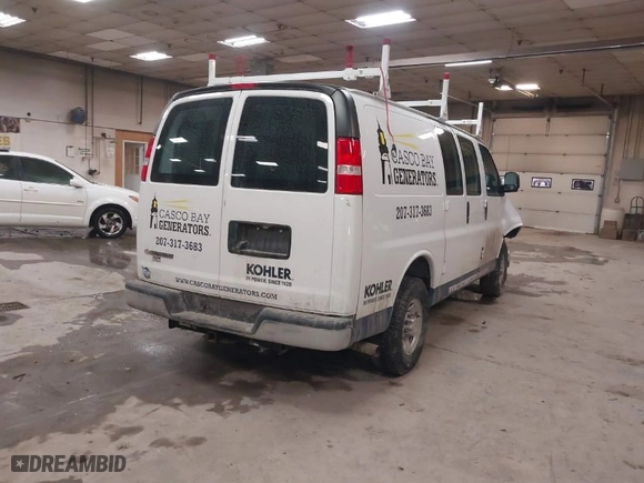 2021 Chevrolet Express Cargo Van with VIN 1GCWGAFP9M1303035, listed as a IAAI auction lot 41503211 with 55,155 mi miles. Bid and sale history available at carsss.com. Image 4.