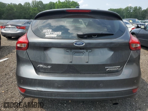 2018 Ford Focus Titanium z VIN 1FADP3N20JL271719, wystawiony jako Copart lot #60784755 z przebiegiem 116 118 mil mil oraz Szkoda całkowita • Salvage title. Historia ofert i sprzedaży dostępna na DreamBid. Obrazek 6.
