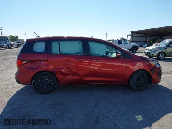 2014 Mazda 5 Sport with VIN JM1CW2BL9E0168662, listed as a IAAI auction lot 42726429 with 145,190 mi miles and . Bid and sale history available at DreamBid. Image 13.