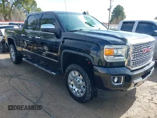 2018 GMC Sierra 2500HD Denali z VIN 1GT12UEG3JF169441, wystawiony jako IAAI lot #41374700 z przebiegiem 102 393 mil mil oraz . Historia ofert i sprzedaży dostępna na DreamBid. Obrazek 1.