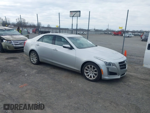 2014 Cadillac CTS Luxury AWD z VIN 1G6AX5SX2E0196881, wystawiony jako IAAI lot #41707633 z przebiegiem 169 168 mil mil oraz . Historia ofert i sprzedaży dostępna na DreamBid. Obrazek 1.