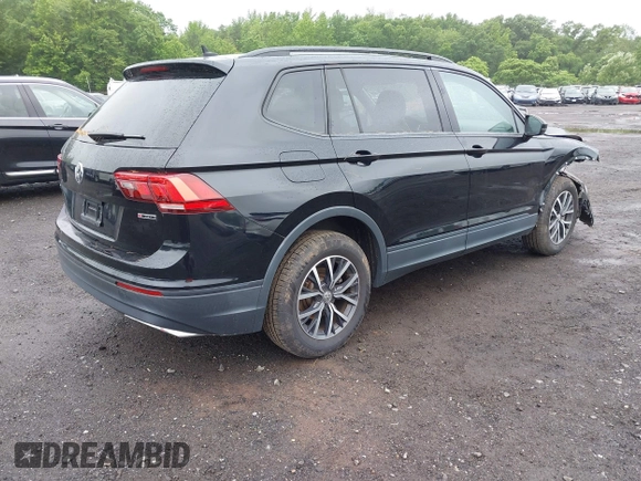 2021 Volkswagen Tiguan S z VIN 3VV0B7AX3MM031908, wystawiony jako IAAI lot #42504384 z przebiegiem 42 510 mil mil oraz . Historia ofert i sprzedaży dostępna na DreamBid. Obrazek 4.