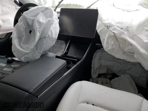 2021 Tesla Model Y Standard Range z VIN 5YJYGDED1MF109091, wystawiony jako Copart lot #50414004 z przebiegiem Nie podano mil oraz Szkody całkowita. Historia ofert i sprzedaży dostępna na DreamBid. Obrazek 9.