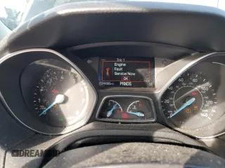 2018 Ford Focus SE z VIN 1FADP3FE6JL232769, wystawiony jako Copart lot #87667595 z przebiegiem 124 496 mil mil oraz Szkoda całkowita • Salvage title. Historia ofert i sprzedaży dostępna na DreamBid. Obrazek 9.