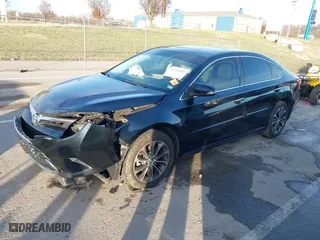 2016 Toyota Avalon Limited with VIN 4T1BK1EB8GU223792, listed as a IAAI auction lot 41115682 with 142,063 mi miles. Bid and sale history available at carsss.com. Image 18.