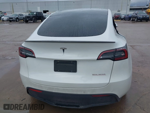 2022 Tesla Model Y Performance with VIN 7SAYGDEF1NF456829, listed as a IAAI auction lot 41448425 with 41,380 mi miles and . Bid and sale history available at DreamBid. Image 15.