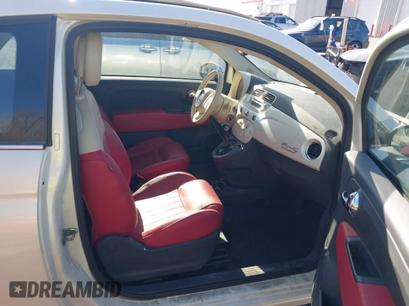 2012 FIAT 500 Lounge z VIN 3C3CFFER7CT119147, wystawiony jako IAAI lot #41431509 z przebiegiem 140 084 mil mil oraz . Historia ofert i sprzedaży dostępna na DreamBid. Obrazek 5.