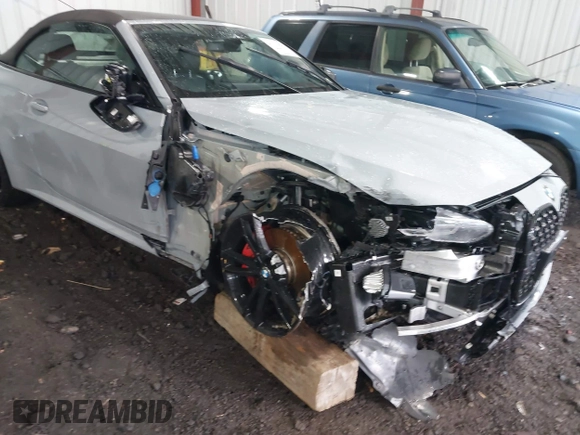 2024 BMW 4 Series 430i xDrive with VIN WBA43AT00RCN83317, listed as a IAAI auction lot 41211849 with 12,000 mi miles and . Bid and sale history available at DreamBid. Image 6.