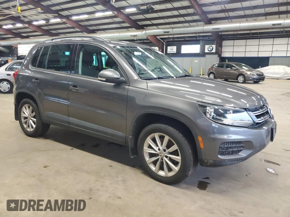 2015 Volkswagen Tiguan SE z VIN WVGBV7AX8FW574023, wystawiony jako Copart lot #50027465 z przebiegiem 101 145 mil mil oraz Czysty tytuł • Clean title. Historia ofert i sprzedaży dostępna na DreamBid. Obrazek 4.