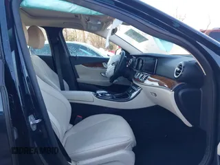 2018 Mercedes-Benz E 300 with VIN WDDZF4KB5JA365156, listed as a IAAI auction lot 41261324 with 73,718 mi miles and . Bid and sale history available at DreamBid. Image 5.
