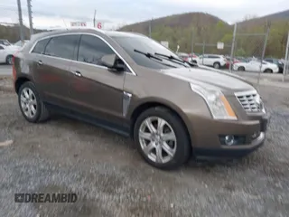 2014 Cadillac SRX Performance Collection with VIN 3GYFNCE33ES570472, listed as a IAAI auction lot 41971511 with 200,811 mi miles. Bid and sale history available at carsss.com. Image 1.