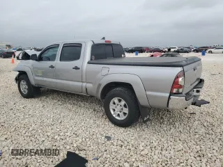 2014 Toyota Tacoma with VIN 3TMMU4FN0EM072840, listed as a Copart auction lot 51740805 with 128,678 mi miles and Salvage title. Bid and sale history available at DreamBid. Image 2.