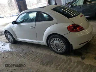 2014 Volkswagen Beetle 2.5L w/Sun with VIN 3VWJP7AT1EM612064, listed as a Copart auction lot 48005055 with 62,290 mi miles and Salvage Title. Bid and sale history available at DreamBid. Image 2.
