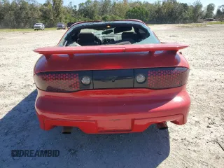 1998 Pontiac Firebird Formula z VIN 2G2FV22G4W2206032, wystawiony jako Copart lot #74949124 z przebiegiem 230 520 mil mil oraz Szkoda całkowita • Salvage title. Historia ofert i sprzedaży dostępna na DreamBid. Obrazek 6.
