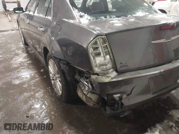 2014 Chrysler 300 C with VIN 2C3CCAKG8EH345577, listed as a IAAI auction lot 41719373 with 152,081 mi miles and . Bid and sale history available at carsss.com. Image 6.