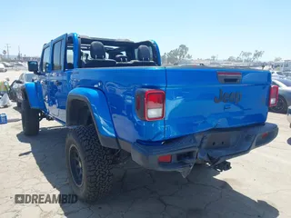 2022 Jeep Gladiator Texas Trail with VIN 1C6HJTAG4NL135346, listed as a IAAI auction lot 42824733 with 40,126 mi miles and . Bid and sale history available at DreamBid. Image 3.