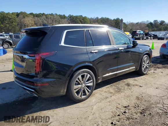 2021 Cadillac XT6 Premium Luxury z VIN 1GYKPCRS8MZ108761, wystawiony jako Copart lot #87185084 z przebiegiem 39 701 mil mil oraz Szkody całkowita. Historia ofert i sprzedaży dostępna na DreamBid. Obrazek 3.