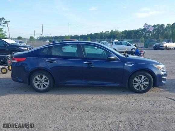 2017 Kia Optima LX with VIN 5XXGT4L35HG174613, listed as a IAAI auction lot 42097790 with 243,335 mi miles. Bid and sale history available at carsss.com. Image 13.
