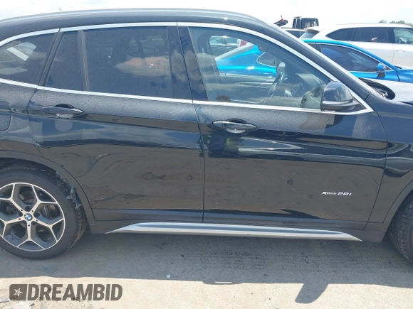 2017 BMW X1 xDrive28i with VIN WBXHT3Z30H4A65417, listed as a IAAI auction lot 42328797 with 103,788 mi miles and . Bid and sale history available at DreamBid. Image 13.