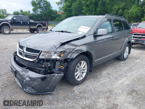 2013 Dodge Journey SXT with VIN 3C4PDCBG8DT517733, listed as a IAAI auction lot 42737063 with 67,363 mi miles and . Bid and sale history available at DreamBid. Image 2.