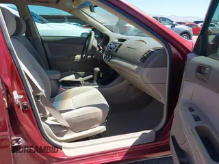 2002 Toyota Camry LE z VIN 4T1BE32K52U082454, wystawiony jako IAAI lot #42276881 z przebiegiem 225 814 mil mil oraz . Historia ofert i sprzedaży dostępna na DreamBid. Obrazek 5.